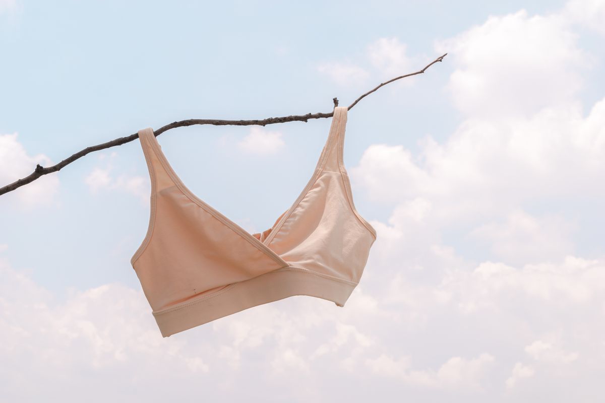 A soft bra hanging gently, illustrating how the wrong fit causes bra marks