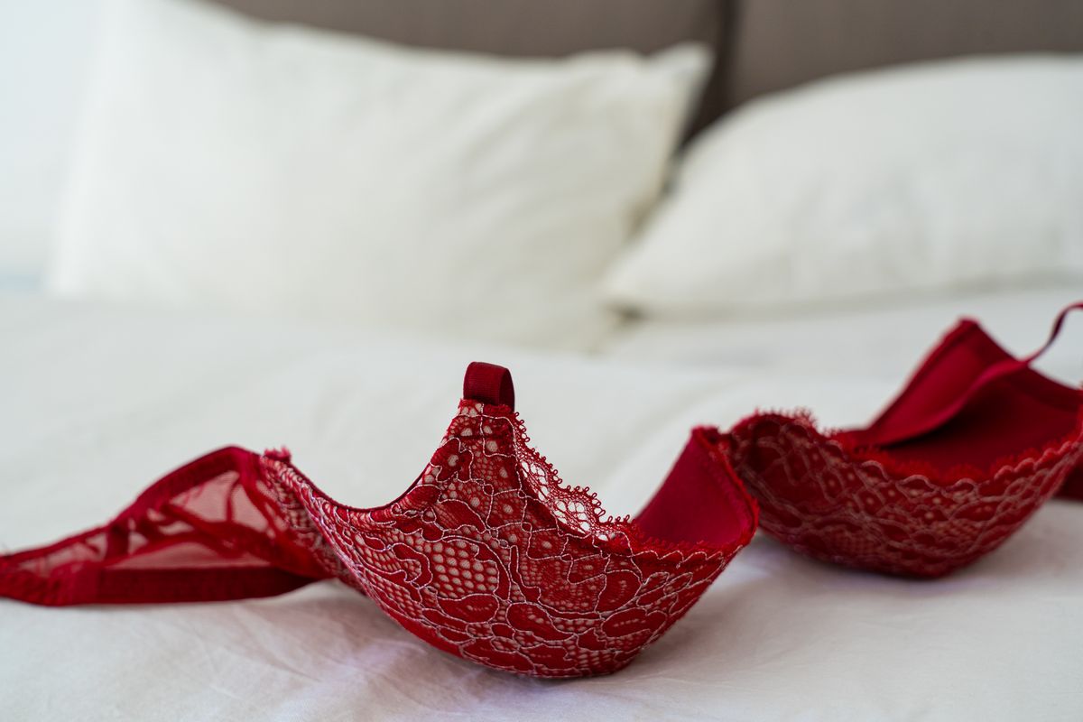 A delicate bra on a hanger, illustrating a bra underwire poking problem