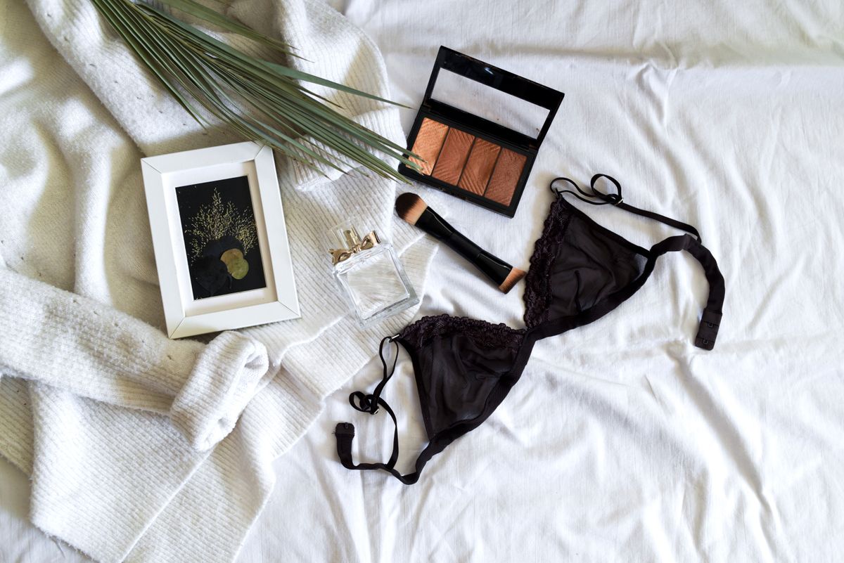 A soft flat lay of lingerie and accessories, for choosing the right bra style