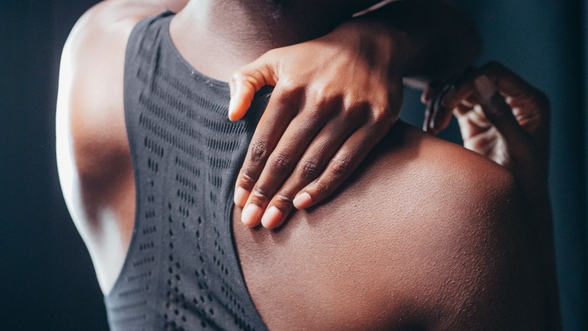 Close-up of a bra strap on a woman's shoulder, the area where bra straps hurt shoulders