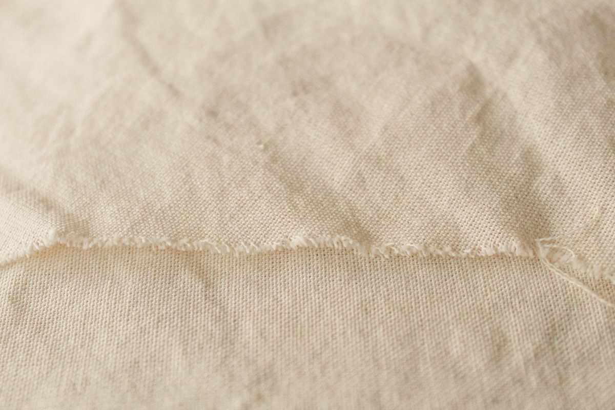 A close-up of soft fabric, representing gentle materials that protect the skin